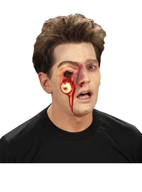 Prótesis de ojo colgando