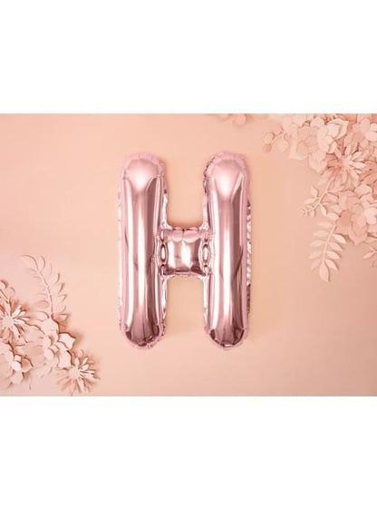 Globo foil letra H oro rosa