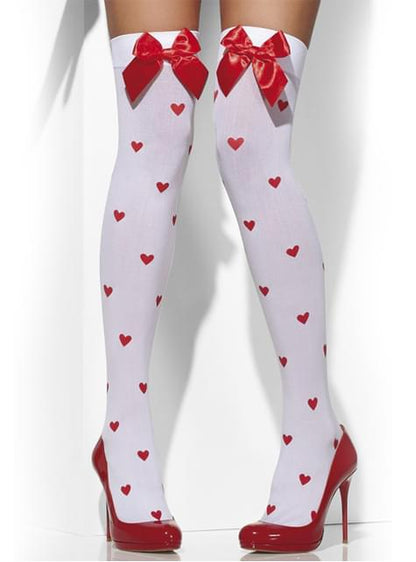 Medias de corazones con lazos rojos
